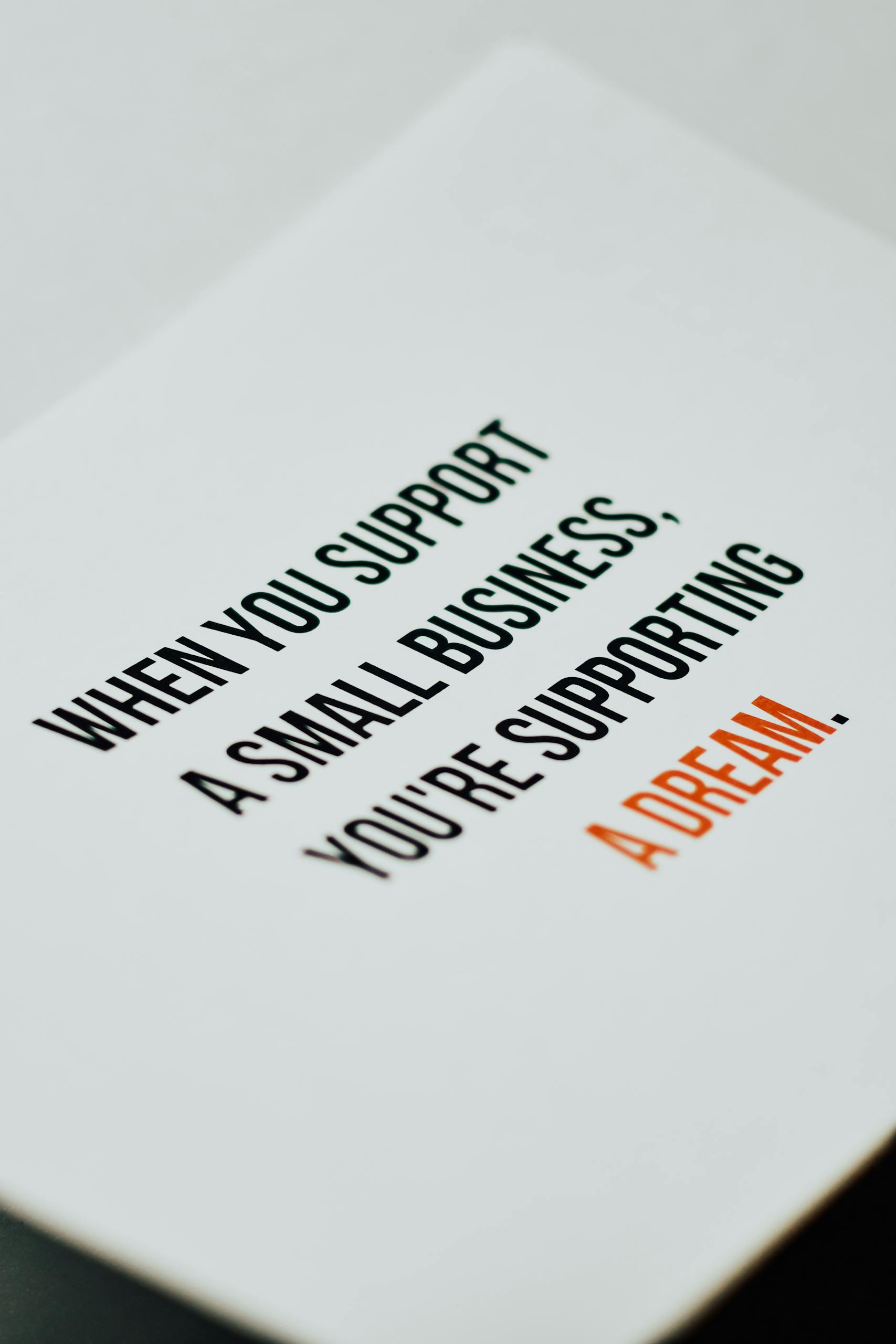 Motivational quote about supporting small businesses, encouraging entrepreneurship and dreams.